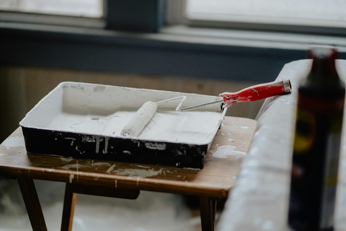 Paint roller and tray showing attention to detail